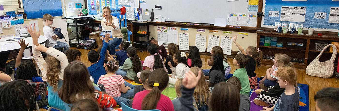 students reading as a class